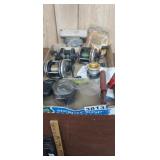 FLAT FULL OF FISHING REELS, ETC.