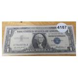 1957 $1 BLUE SEAL SILVER CERTIFICATE