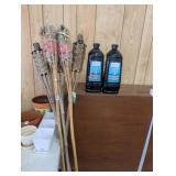 LOT OF TIKI TORCHES AND FUEL (BOTTLES OPENED)