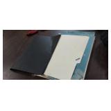 FOLDER WITH PAPERWORK