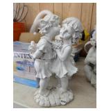 BOY KISSING GIRL STATUE