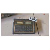 TAPE MEASURE WITH CALCULATOR AND LEVEL