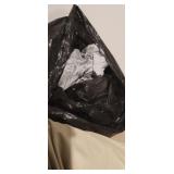 TRASHBAG FULL OF BEDDING
