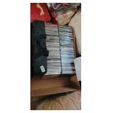 BOX OF CDs AND CASSETTE CASE
