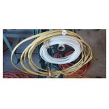 EXTENSION CORD AND PLASTIC TUBING