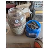CAN WITH STEEL WOOL  AND SANDING DISCS