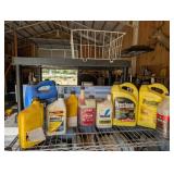LOT OF OIL, ANTIFREEZE, ETC. MOSTLY FULL