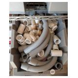 TOTE FULL OF PLUMBING COMPONETS