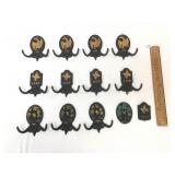 Lot of 11 Cast Iron Fire Plaque Coat Hooks and 2 P