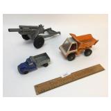 Lot of 2 Toy Trucks and A Cannon