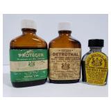 Vintage gun oil bottles