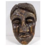 Clay face portrait art piece