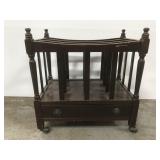 Vintage rolling magazine rack