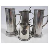 Tall metal beer steins with clear bottoms