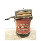 Old oil can w/ primitive stocking ringer