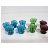 Nine colorful antique glass drawer pulls