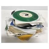 Stack of 45 rpm vinyl records w/ juke box tags