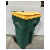 Large rolling trash or recycling can bin