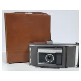 Vintage Polaroid camera with case