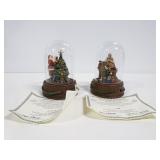 Pair of Norman Rockwell Santa Claus sculptures