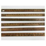 Six wooden yard sticks w/ old advertising