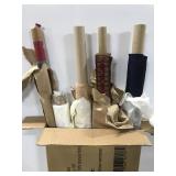 Five rolls of fabric