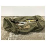 Green vintage canvas bag w/ metal tent stakes
