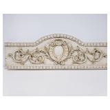 Faux wood scrolling wall art