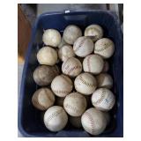 Bin of softballs