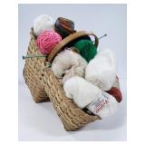 Basket of knitting needles and yarn