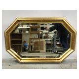 Gold framed wall mirror