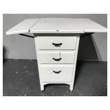 Small drop side porcelain top kitchen cabinet