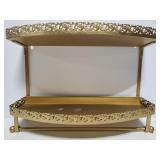 Metal gold toned bathroon shelf