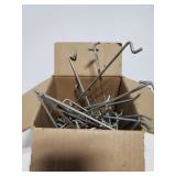 Box of assorted peg board hooks