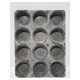 Old graniteware muffin pan