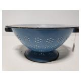 Old blue porcelain enamel kitchen strainer