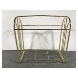 Gold toned metal towel rack