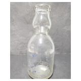 Unusually shaped glass Purity milk bottle