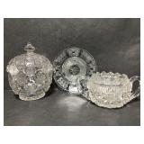 Cut glass petite plate, lidded jar and sugar bowl