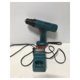 Makita 9.6 V cordless drill and charger
