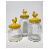 Ribbed glass jars with ceramic tooster tops