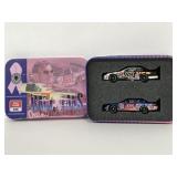 Tin of two Dale Jarrett #88 collectible race cars