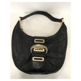 Black Michael Kors handbag with gold hardware
