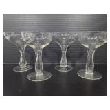 Four glass open stem glasses