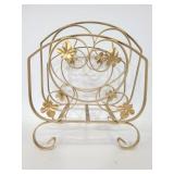 Ornate metal magazine rack