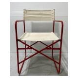 Vintage red metal & canvas folding chair