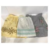 Trio of cloth kitchen waist aprons