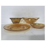 Four pieces of carnival glass