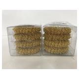 Two new gold napkin ring sets