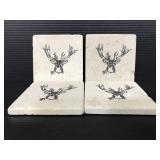 Four stone deer coasters
